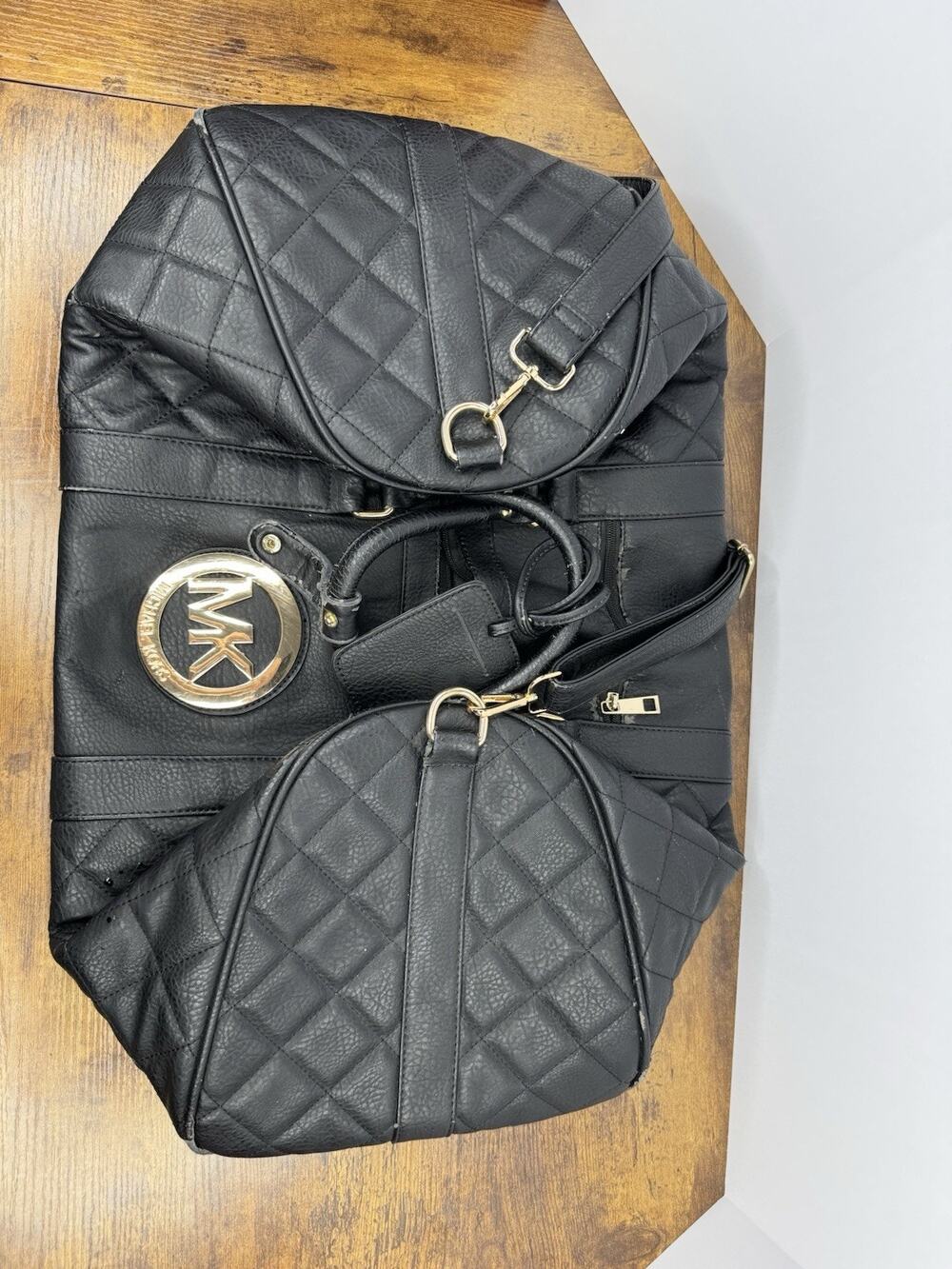 Michael Kors Black Quilted Large Duffle Bag Gold MK Medallion Shoulder Strap